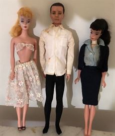First year - Original Barbies (one blonde and one brunette) and Ken dolls