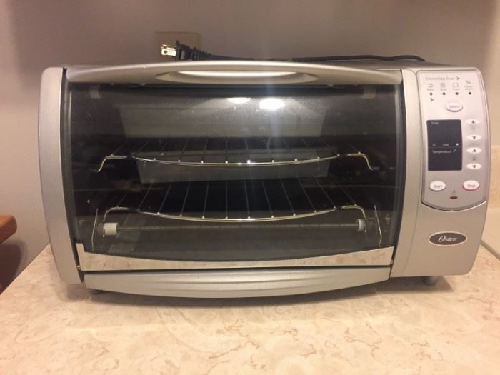 BRAND NEW-never used convection/toaster oven.  Comes with manual and backing sheets/trays