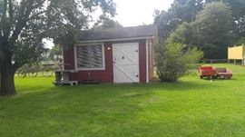 Tool shed with tons of man stuff