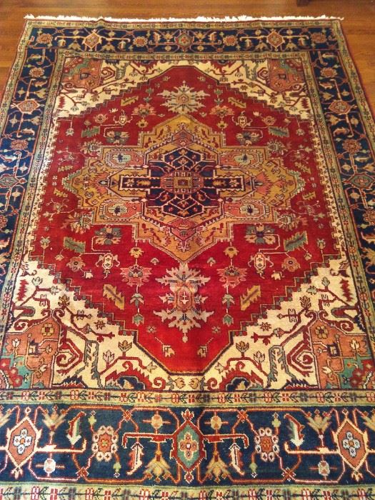 Hand Woven Persian Heriz design rug, 100% wool face, measures 8' x 10'.
