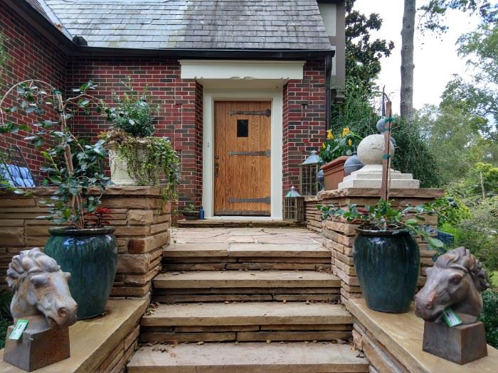 Quite inviting entrance, wouldn't ya say? All that's missing is a pineapple.                                                                    Nice pair of blue/green glazed terra cotta pots - LOVE the cast iron horse heads!