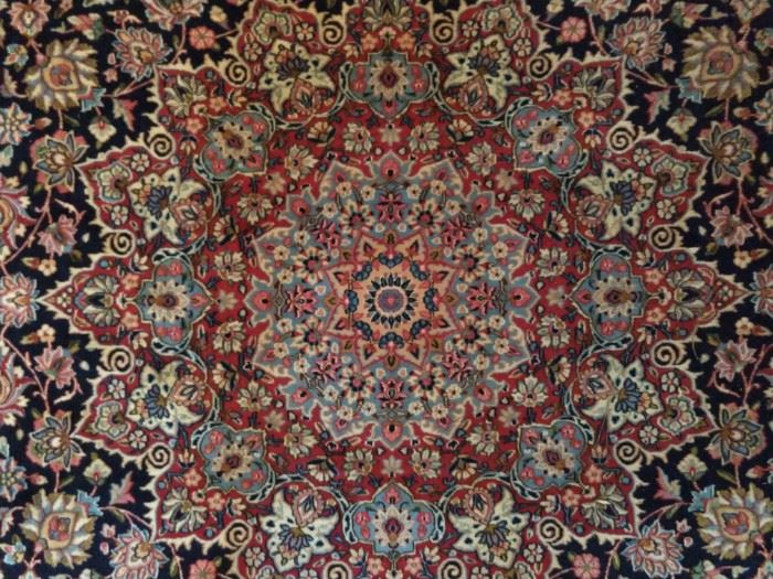 Center medallion of this magnificent Persian rug!