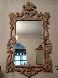 Big ol' swanky mirror in the dining room, above the serpentine mahogany sideboard.