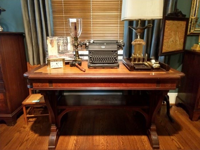 Antique English burled library table, with leather top, stretcher below and side drawer, formerly owned by a prominent female Marietta lawyer, Katherine Hardy. LOVE the vintage Royal typewriter!