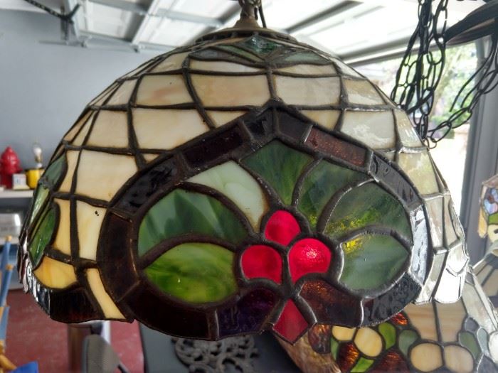 Evidence of a change in lighting decor - this is one of four stained glass chandelier's available. 