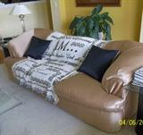 Sofa with tailored cover
