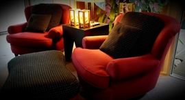 pair of modern arm chairs and ottoman
