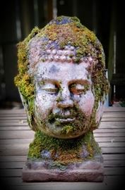 concrete buddha bust