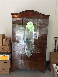 Antique inland armoire with mirror