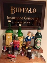 Empty bottles, shot glass collection