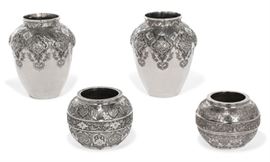 Lot 9 Two pairs of Persian silver vases 
Modern 