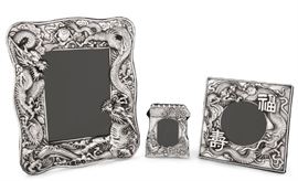 Lot 10 Three decorative silver table top picture frames  
Marked 925, modern 