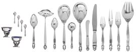 A Danish sterling silver Art Deco part flatware service  
By Georg Jensen, Copenhagen, post 1945 
Acorn (Konge) pattern, comprising: 24 dinner forks, 24 dinner knives, 24 fish forks, 1 bouillon spoon, 24 butter spreaders, 24 oval bowl soup/dessert spoons, 24 teaspoons, 4 salt spoons, 2 salt cellars (#741) and 8 serving pieces (159)  