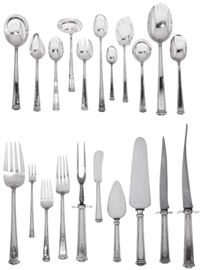 Lot 24 An American sterling silver part flatware service  
By International Silver Co., Meriden, CT, 20th century 
Pantheon pattern, comprising: 8 dinner forks, 12 dinner knives, 7 salad/dessert forks, 6 bouillon spoons, 10 cocktail forks, 10 butter spreaders, 6 gumbo spoons, 8 teaspoons, 4 five o'clock teaspoons, 11 ice cream forks, 9 citrus spoons, 5 iced teaspoons, 3 demitasse spoons, 3 table spoons, 8 serving pieces, monogram: RCM (110)  
with a canteen  
