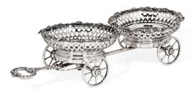 Lot 26 An English silverplate two-coaster wine trolley  
by Henry Wilkinson & Co, late 19th/early 20th century 
