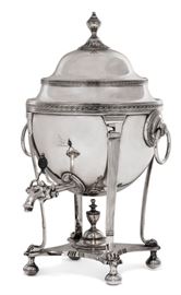Lot 28 A Regency Old Sheffield Plate hot water urn  
First quarter 19th century 
Engraved with a heraldic crest  