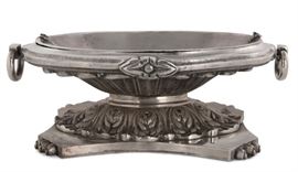 Lot 35 A Neoclassic style silvered metal oval two-handled jardinière 
Modern 
With liner insert, on paw feet  