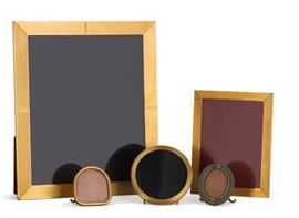 Lot 42 An assembled collection of five French gilt-metal tabletop picture frames  
By Cartier and Hermes, Paris, modern 
Comprising three Hermes with woven borders and two smaller Cartier  