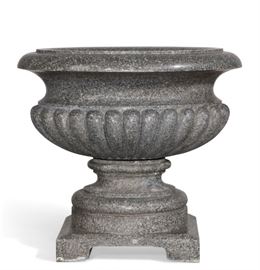 Lot 48 An imposing Neoclassical style carved and polished granite jardinière 
20th century 