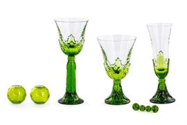 Lot 56 A suite of St. Louis for Christofle crystal table ware 
post 1950 
Comprising twelve 7 5/8in champagne flutes, twelve 8 3/8in white wine, twelve 6 1/2in red wine, twelve salt and peppers and twelve knife rests, etched factory mark. 