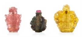 Lot 68 Three Chinese carved hardstone snuff bottles 
19th-20th century 