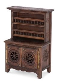 Lot 79 A French provincial miniature vasselier 
20th century 
Together with a miniature windsor conversation seat and matching chair, 20th century.  