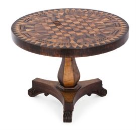 Lot 82 A parquetry inlaid miniature tilt top breakfast table 
19th century 
As a cribbage board.  