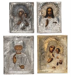 Lot 86 Four Eastern Orthodox painted icons with oklads 
various makers, 19th-20th century 
Including Christ Pantocrator, oklad apparently unmarked, the Mother of God, gilt oklad apparently unmarked, the Mother of God with oklad variously marked 84 standard silver, within a gilt frame and shadowbox case and St. Nicholas, oklad double stamped 84 standard silver, tempera on panel.  