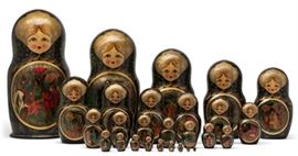 Lot 90 Two sets of Russian hand painted Matryoshka nesting dolls 
signed and dated to undersides, 1996 
The larger lacquer, 27 pieces, the smaller 18 complete pieces and three part pieces.  