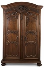 Lot 91 A good and imposing Louis XV carved walnut armoire 
second quarter 18th century 
height 112 1/2in (285.5cm); width 77 1/4in (196cm); depth 32in (81cm) 