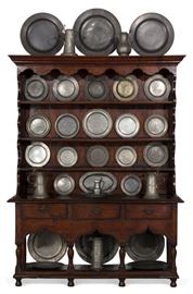 Lots 93 A collection of Continental domestic pewter articles 
18th/19th century 
 Comprising a flagon, five lidded pitchers and twenty seven plates. 