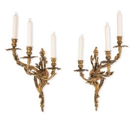 Lot 99 A good pair of Louis XV style gilt bronze three light bras de lumière 
Raingo Frères 
late 19th century 
Both stamped RAINGO, one numbered 1052 and the other 1053.  