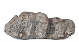 Lot 103 A large Lingbi 'Contemplation' stone 
height 15 1/2in (39.5cm); length 37in (94cm) width 20in (51cm) 