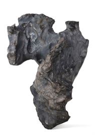 Lot 104 A massive Lingbi 'Contemplation' stone 
Height 42in (107cm); width 24in (61cm); depth 16 1/2in (42cm) 
