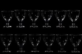 Lot 118 A suite of Lalique stemware in the Argos pattern 
20th century 
Comprising six 5in water glasses and six 4 1/4in Bordeaux glasses, each incised Lalique® France. 