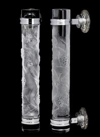 Lot 120 A pair of Lalique frosted and clear glass door handles: Faunes 
20th century 
Each fitted in chrome mounts and incised Lalique® France.  
