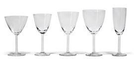 Lot 124 A suite of Lalique frosted and clear glass stemware in the Phalsbourg pattern 
20th century 
Comprising six 6 1/2in red wine, eleven 6 7/8in white wine, eight 7 1/4in water goblets, seven 7 5/8in tall water goblets, fifteen 8in flutes, incised Lalique® France. (47) 