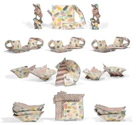 Lot 129 A Carol McNicoll glazed pottery service 
late 20th century 
Comprising a covered pitcher, height 8in; six cups and saucers; five bowls; six square form dishes, greatest width 10in and pair of candlesticks, height 8 1/4in; each signed in black to underside. 