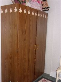 Large particle board armoir/closet.