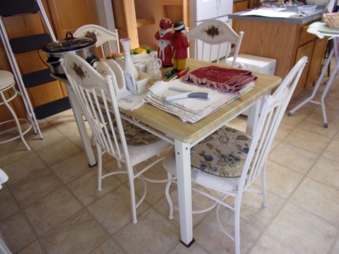 Laminate "butcher's block" look small dining table and 4 metal chairs with white upholstered seats. One matching swivel barstool.