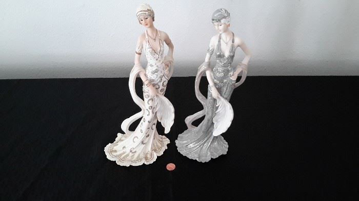Plaster flapper girl figurines.