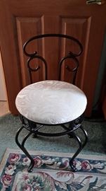Metal vanity chair with lovely cushion.