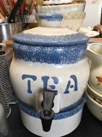 Ceramic tea dispenser.