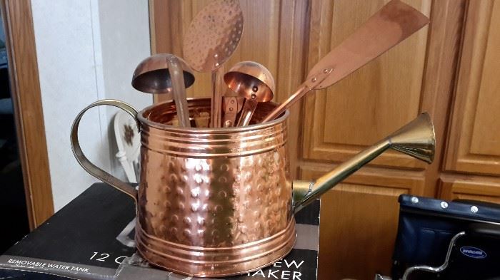 Copper plant waterer and utensils.