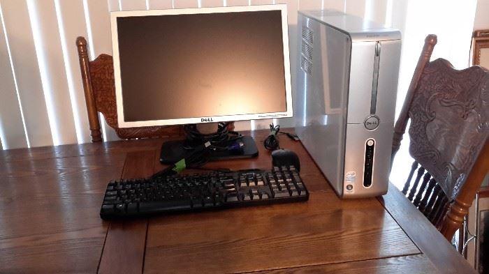 Dell computer, keyboard and mouse.