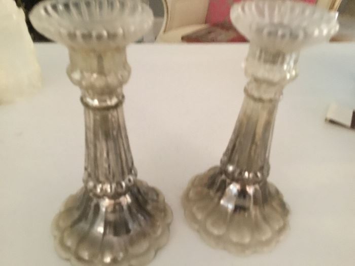 Antique mercury glass candlesticks.