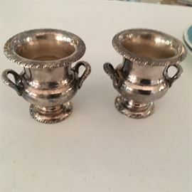 Pair of small silver plate urns.