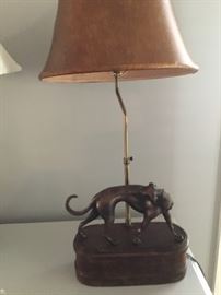 One of a pair of greyhound lamps.
