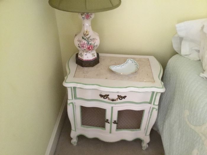 One of a pair of bedside tables.