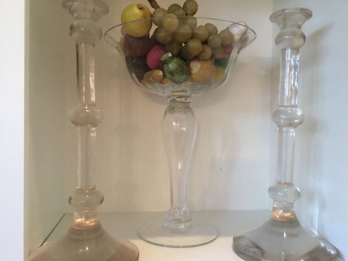 Very large pair of glass candlesticks and compote with fruit. Some damage to rim of compote on back side.